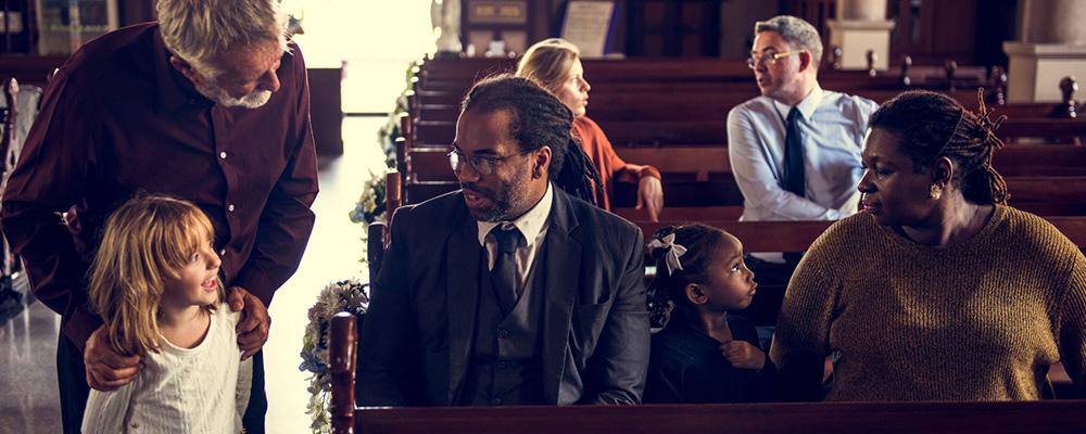 People greeting each other in church 