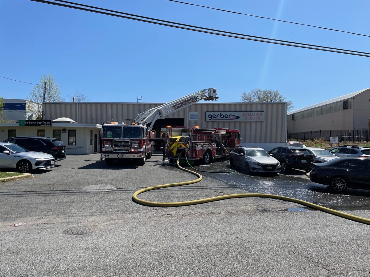 Fire engine in front of car business fire