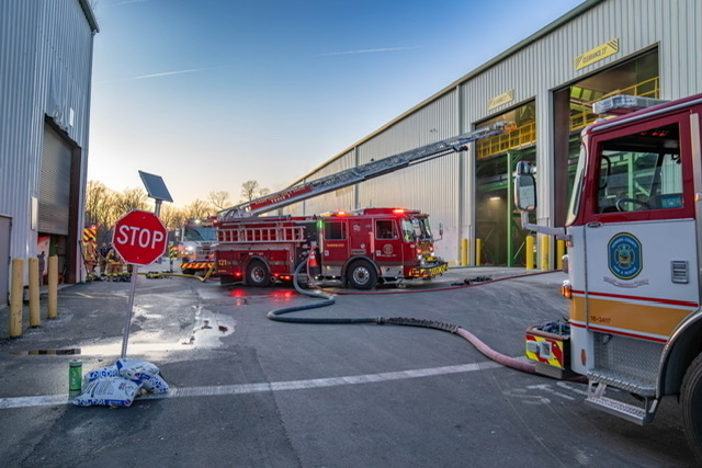 Fire engines posted outside of waste facility fire