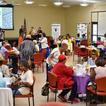 Older adults at the Bain 50+ Center playing Drag Bingo.