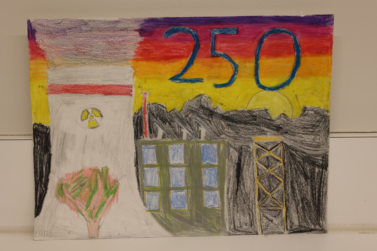 Child's drawing is of a factory with a colorful sunset.