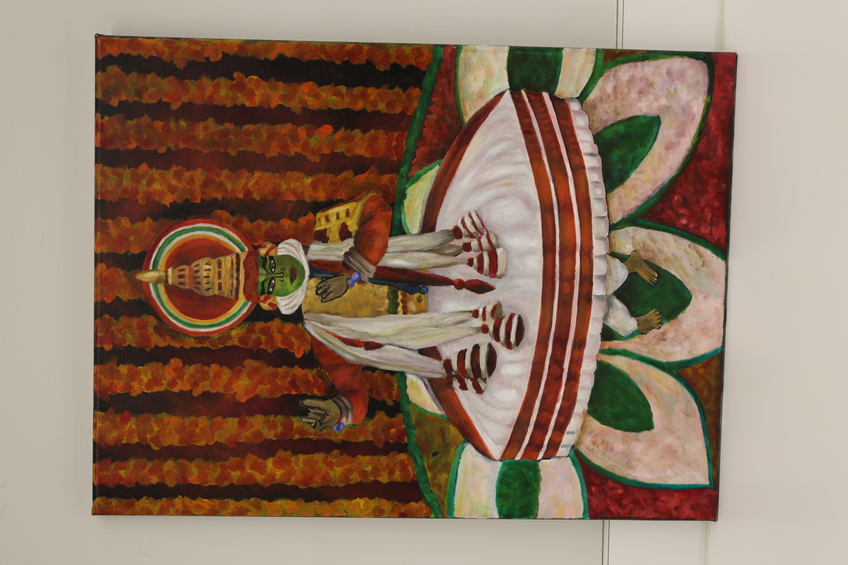 This artwork is of a person performing a traditional Indian dance called Kathakali.