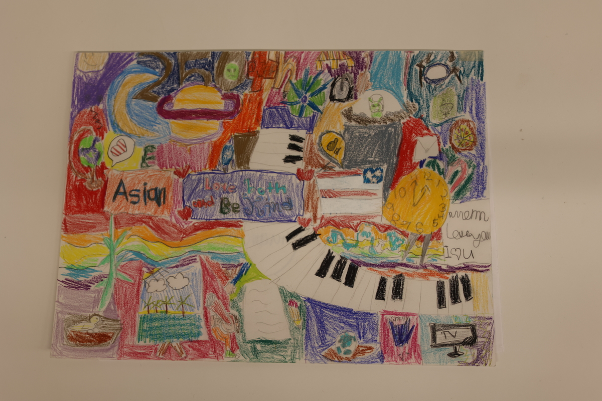 Child's drawing with, rainbow, a piano, clock, moon and a flag.