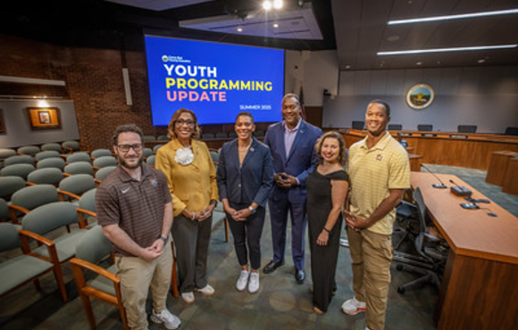 Officials at Youth Programming Update presentation