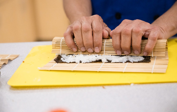 Learning how to roll sushi