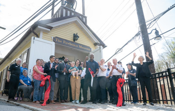 Officials and guests cut the ribbon on renovated Ellicott City Firehouse Museum