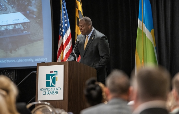 County Executive Calvin Ball at the podium delivering his 2026 State of Business address to the Howard County Chamber of Commerce and attendees at its annual luncheon event.