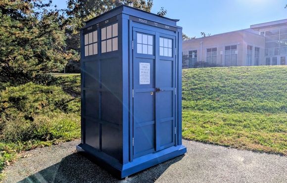 Howard County Government’s blue #HoCoTARDIS Little Free Library stationed along a pathway/roadway just outside the County's North Laurel Community Center in Laurel.