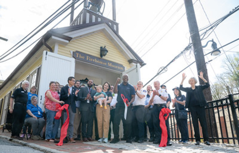 Officials and guests cut the ribbon on renovated Ellicott City Firehouse Museum