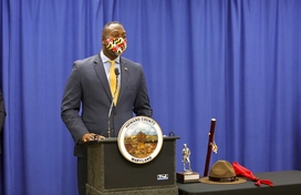 Calvin Ball standing at podium 