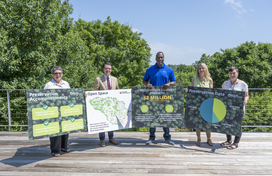 Group holding signs