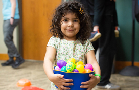 Eggstravaganza event holding eggs