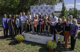 A photo of County Executive Calvin Ball and attendees at the groundbreaking ceremony for Community Action Council of Howard County's new Route One Corridor Campus.