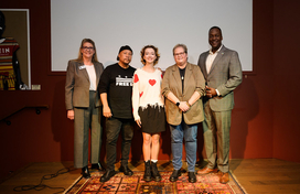 A photo County Executive Calvin Ball and others with Howard County's newest Youth Poet Laureate Penelope Tofigh.