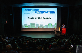 A photo of County Executive Calvin Ball delivering his 2025 State of the County address at Howard Community College on September 30 2025.