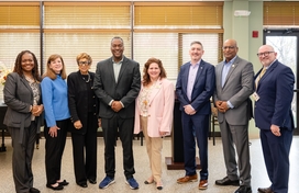 County Executive Calvin Ball with members of the County's Department of Community Resources and Services and other posed for a photo at the announcement that the County has joined the National Dementia-Friendly network.