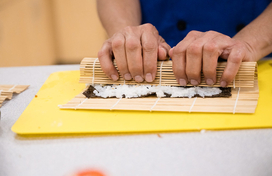 Learning how to roll sushi