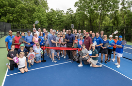 Ribbon cutting at opening of pickle ball court at Alpha Ridge Park