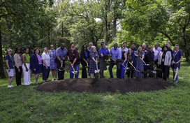 County Executive Calvin Ball posed with other Howard County Government employees and Elkridge community members holding up shovels after just digging into a dirt mound to mark the groundbreaking of the new Elkridge Community and 50+ Center on August 3, 2026.