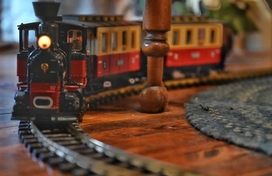 A model train passes on the track.