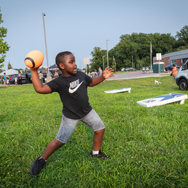 Boy playing with a football