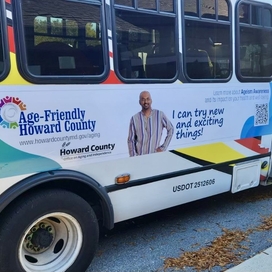 Bus with Age Friendly Howard County Ageism Awareness campaign message: I can try new and exciting things!