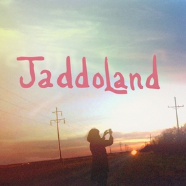 An outdoor sunset with the text 'Jaddoland'