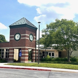 Outside of the Owen Brown Community Center, including the large clock tower