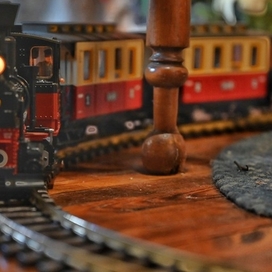 A model train passes on the track.